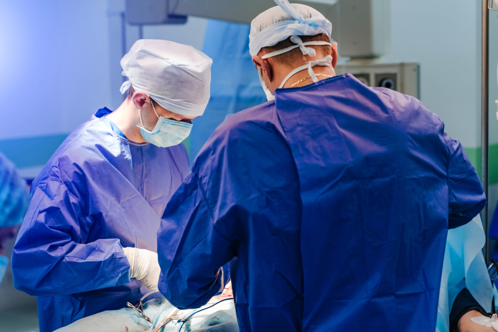 doctors performing back surgery to repair defective spinal stimulator - Lawsuit Legal News